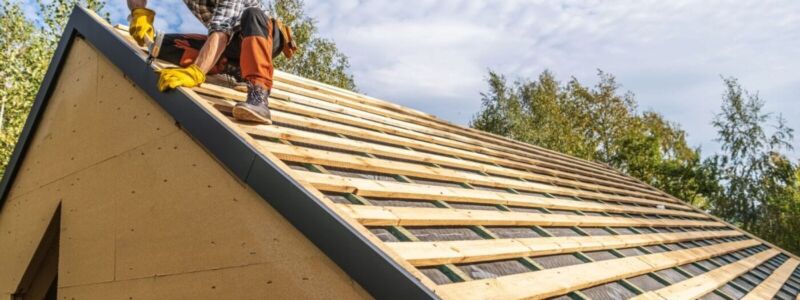 Professional Construction Worker Assembling Roof Wooden Elements